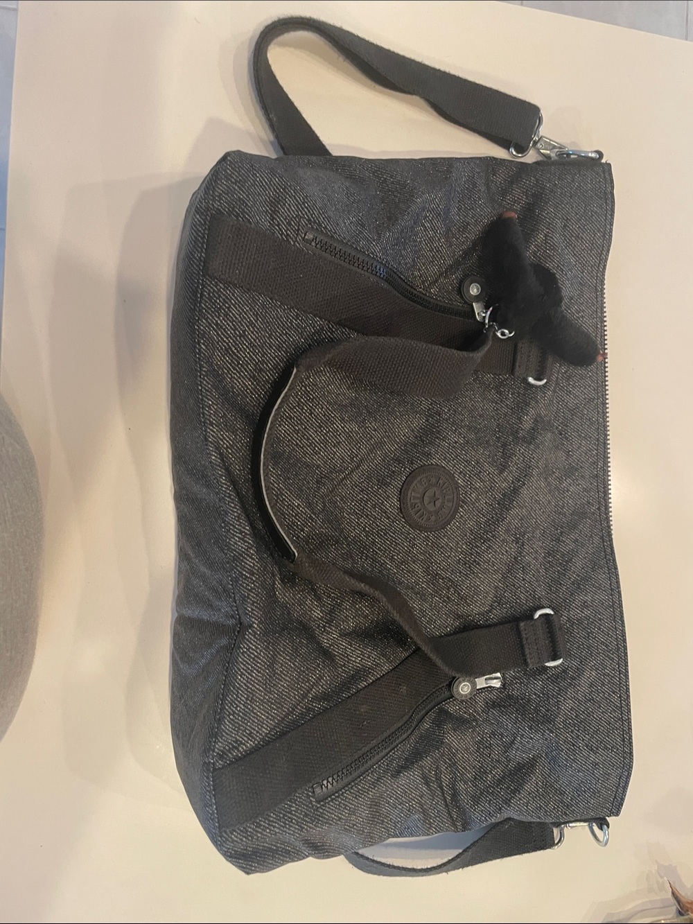 Kipling Charcoal Gray Duffel Bag with Signature Charm